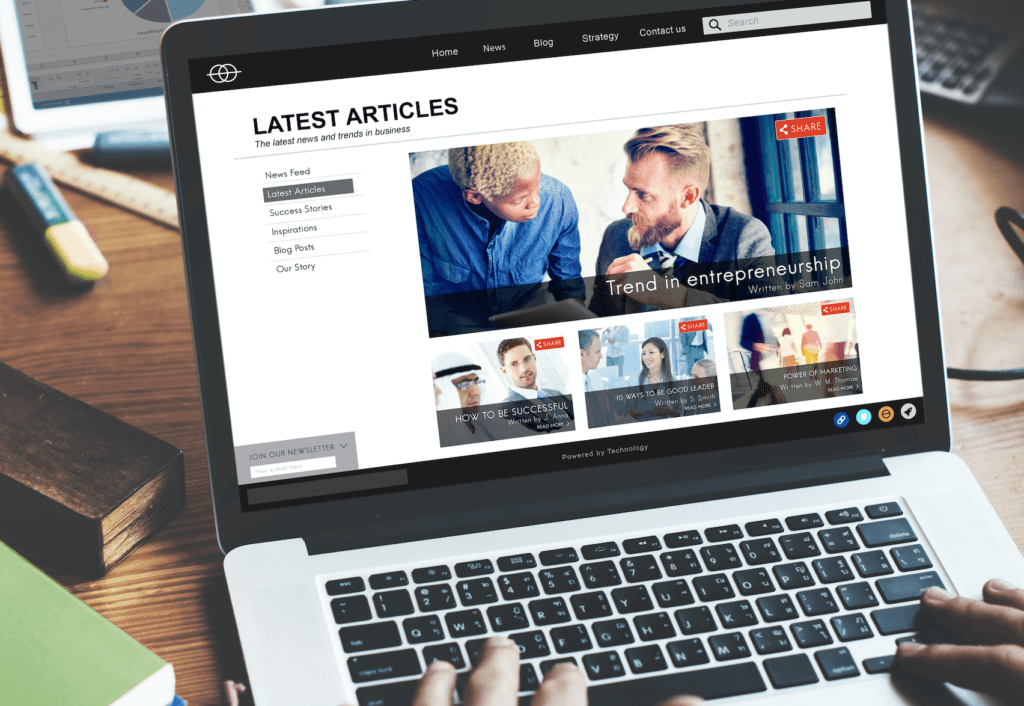 Laptop showing news website homepage
