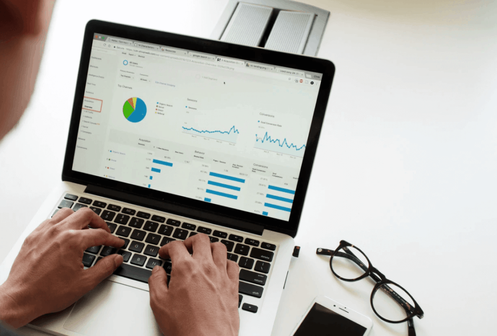 Person using laptop to look at website analytics